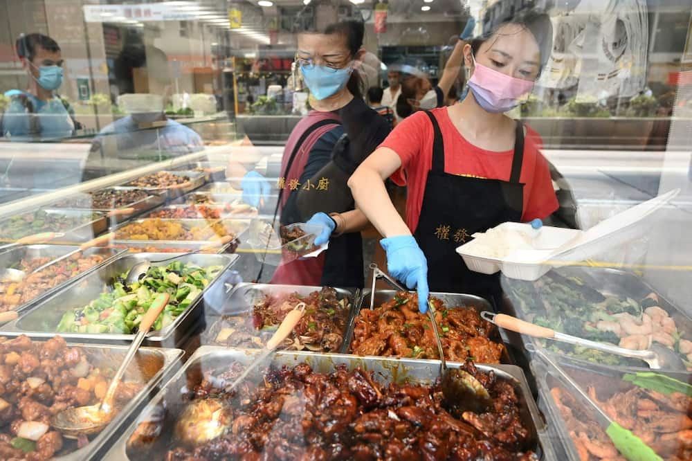 Small shops selling inexpensive two-dish mealboxes have mushroomed across Hong Kong