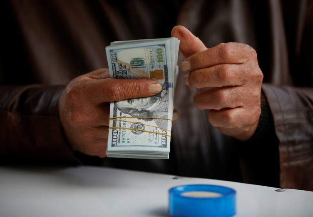 Some Iraqi officials have placed the blame for the dinar's woes squarely on the shoulders of one actor -- the United States