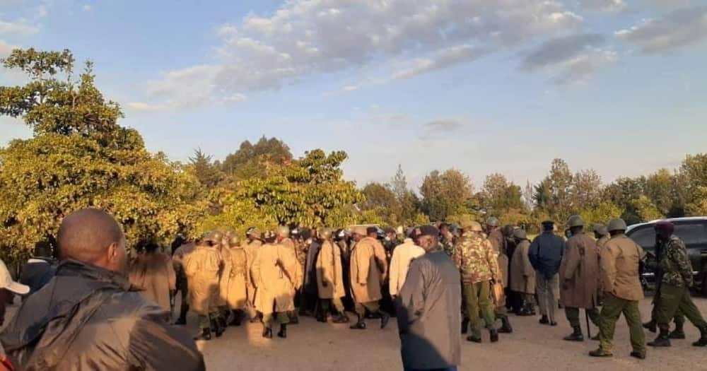 Police officers leave Oscar Sudi's home after unsuccessfully trying to arrest him