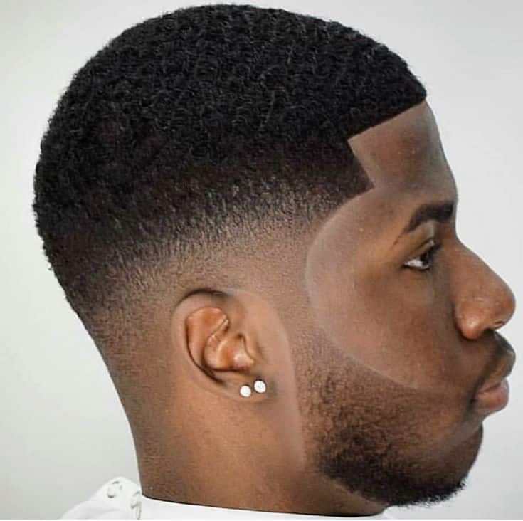 Low fade hairstyle for men with round faces
