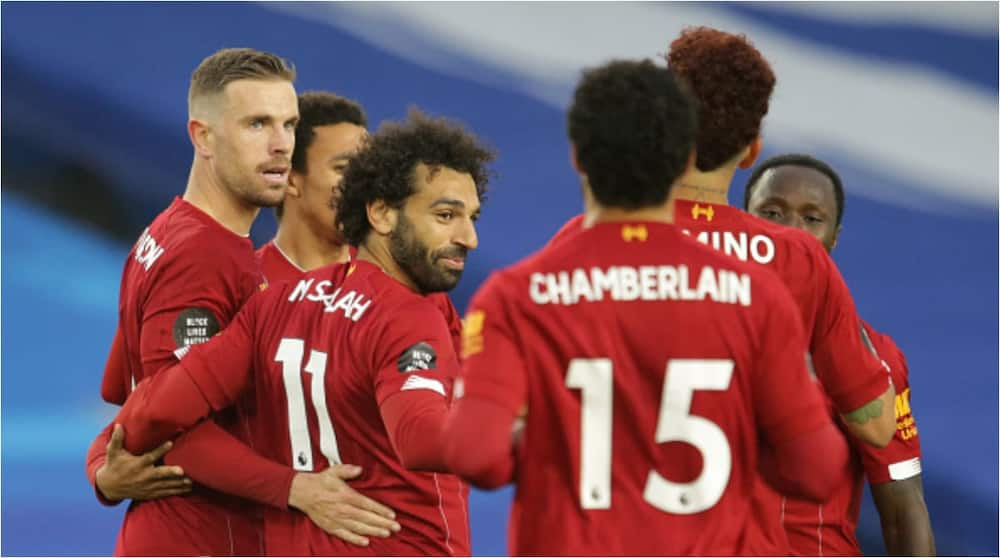 brighton vs liverpool: salah nets brace, henderson score as reds