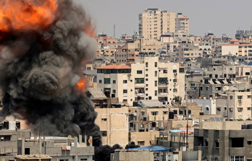 Smoke billows from an Israeli air strike in Gaza City on August 6, 2022