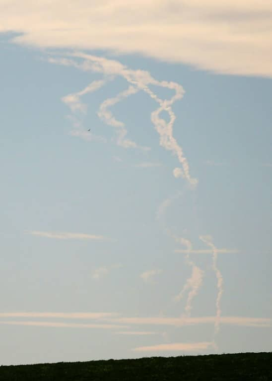 Rockets trails are seen in the sky in Ukraine's eastern Donbas region