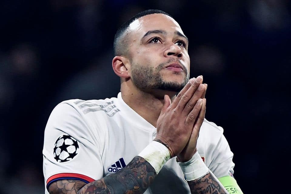 Memphis Depay of Lyon - showing his lion tattoo on his back - is frustrated  during the French championship Ligue 1 football match between Stade de  Reims and Olympique Lyonnais (OL) on