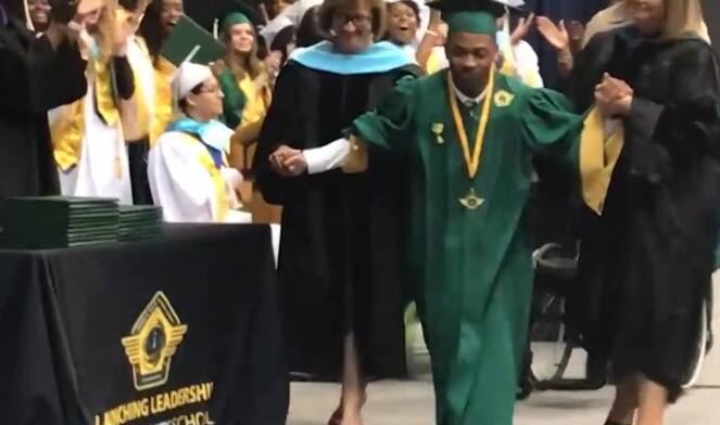 Teen with cerebral palsy evokes emotion as he walks across graduation square