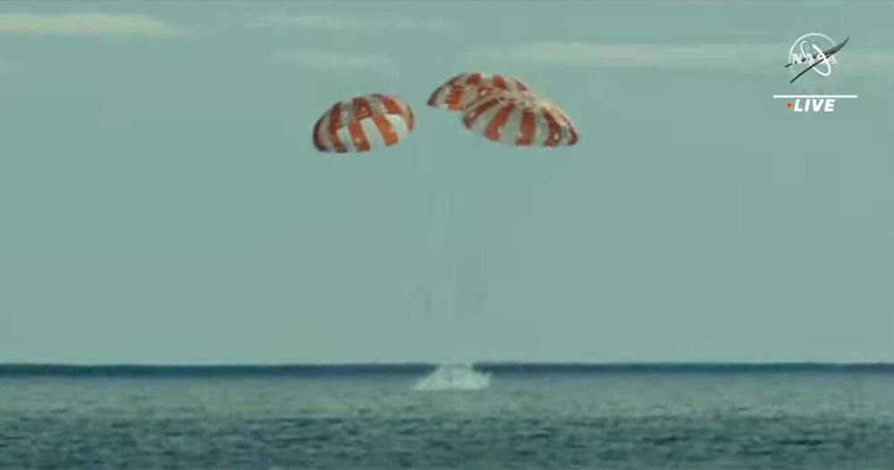 In this still image taken from NASA TV, NASA's unmanned Orion spaceship splashes down in the Pacific Ocean off Baja California, Mexico, on December 11, 2022