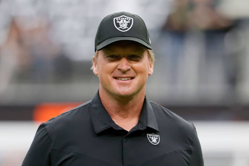 Head coach John Gruden of the Las Vegas Raiders looks on before a game against the Chicago Bears at Allegiant Stadium on October 10, 2021 in Las Vegas, Nevada.