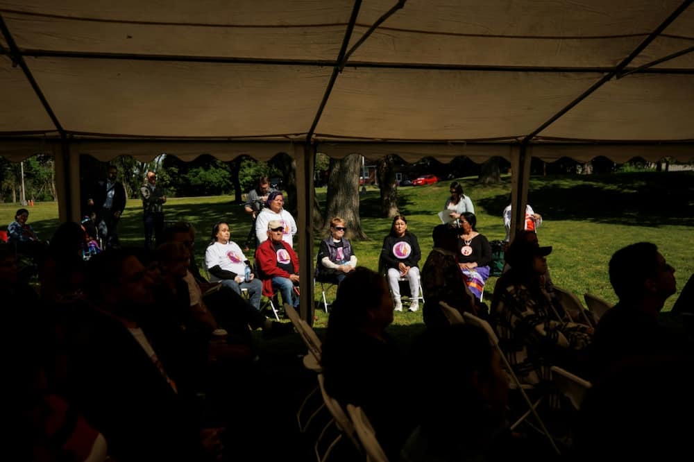 Survivors of the Mohawk Institute, an Indigenous residential school, look on prior to a commemorative tree planting ceremony to honour and remember survivors in Brantford, Ontario, Canada, on May 24, 2022