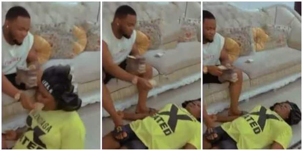 Reactions as Nigerian man motivates wife using money, video causes sitr