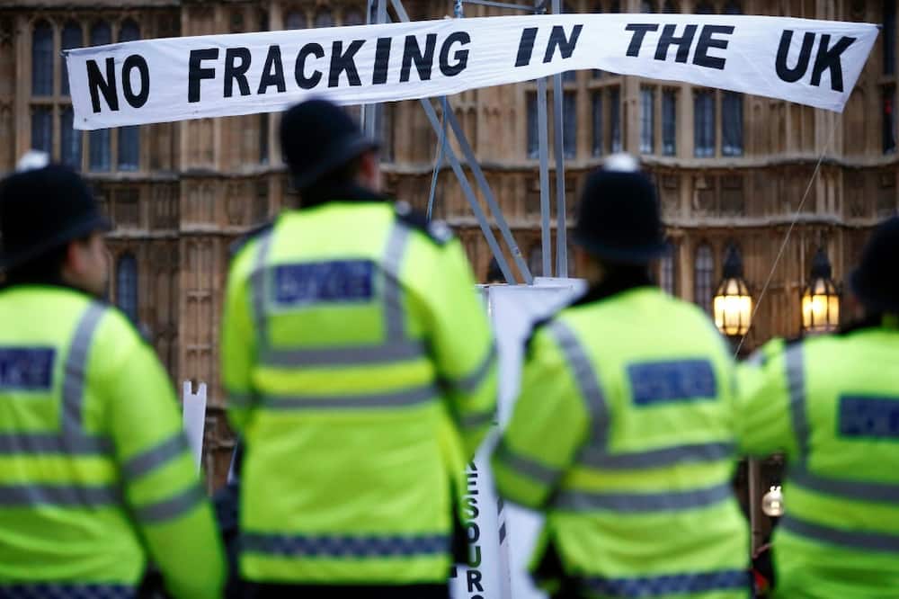 Protestors erected a mock gas fracking rig in front of Britain's Houses of Parliament in 2012
