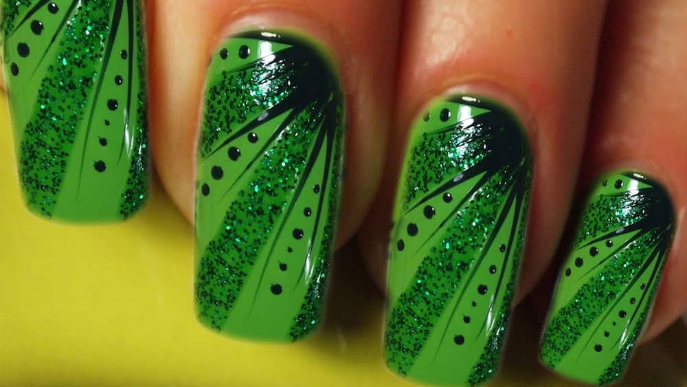 Green dots St. Patrick's Day nail design.