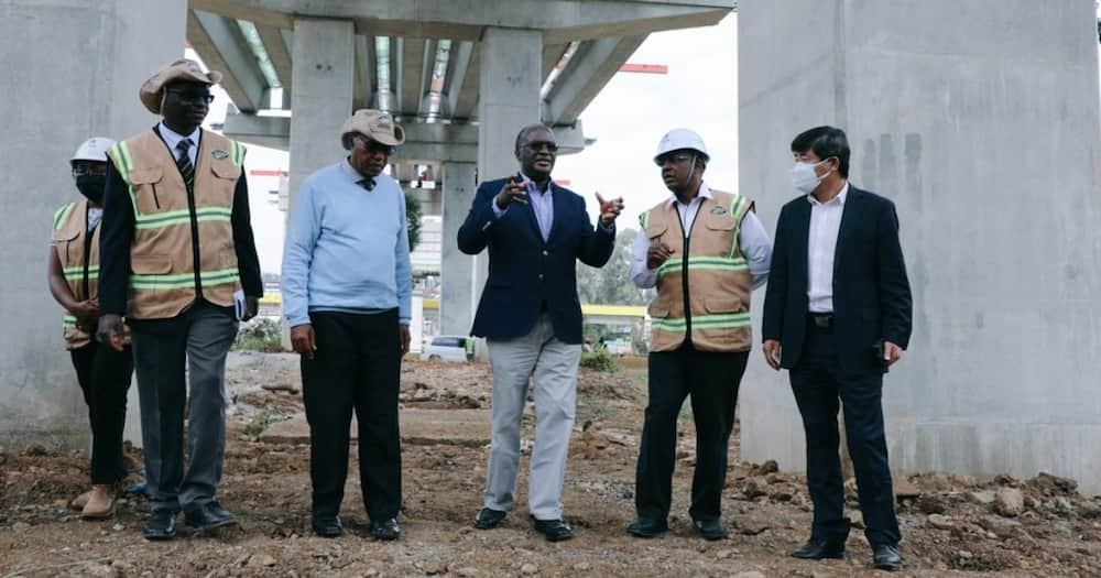 Transport CS James Macharia (third right) said the Nairobi Expressway would be complete in 2022.