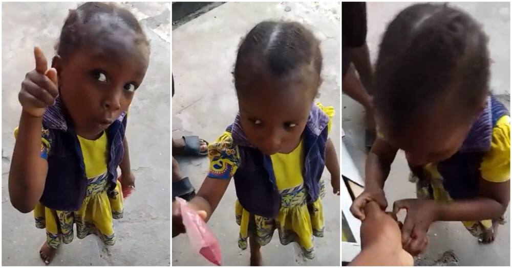Young girl boldly demands money from shop keeper