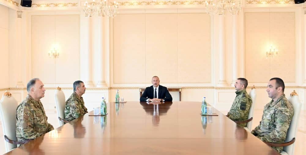 Azerbaijan, whose  President Ilham Aliyev met military leaders Tuesday, said it was responding to "large-scale subversive acts" by Armenia