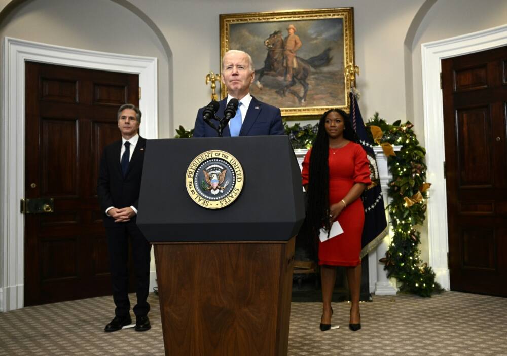 US President Joe Biden, with Secretary of State Antony Blinken (L) and Cherelle Griner, speaks about the release of Brittney Griner at the White House on December 8, 2022