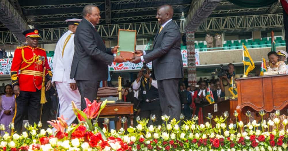 Uhuru hands over power