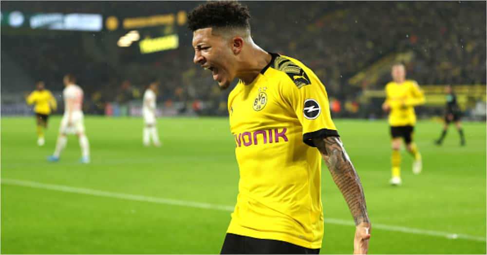 Jadon Sancho celebrates after scoring for Dortmund. Photo: Getty Images.