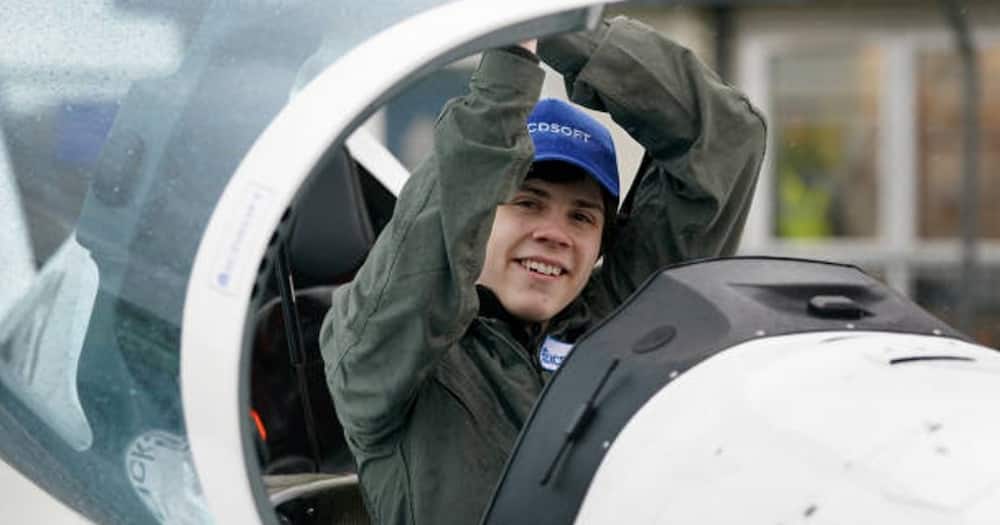 16-year-old pilot Mack Rutherford with his Shark UL plane at the announcement of his bid to become the youngest male to fly solo round the world, at Biggin Hill Airfield, Westerham, Kent.