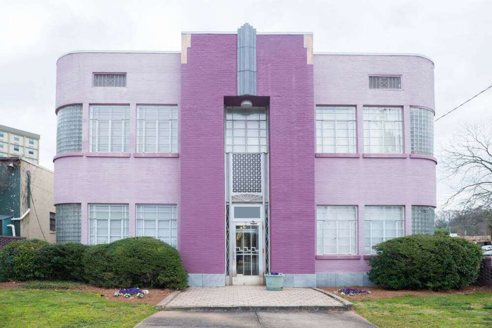 A photograph of a purple Art Deco residential building in Decatur, Georgia.
