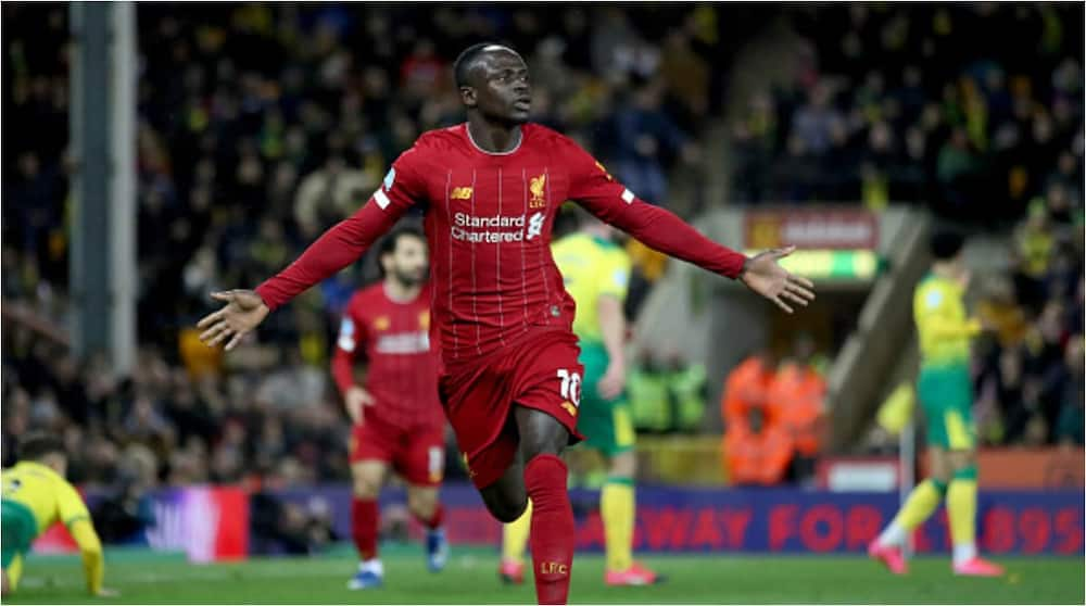 Sadio Mane celebrates a goal for Liverpool. Photo: Marc Atkins.