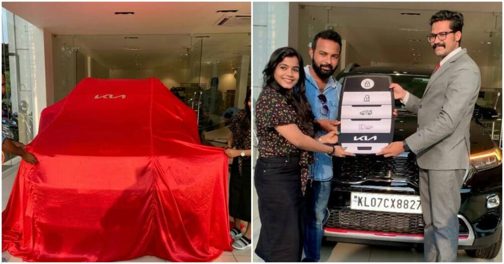 Woman gifts hubby a car.