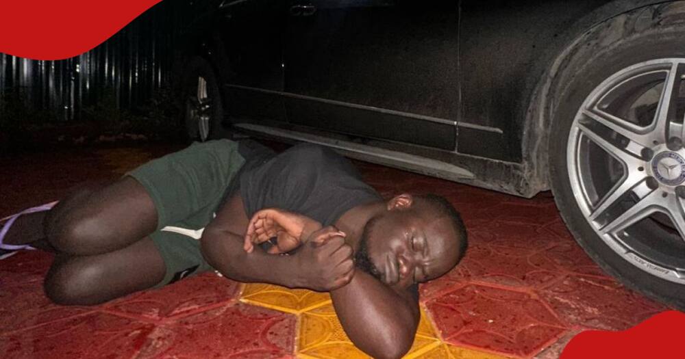 Kenyan comedian Mulamwah sleeps next to his newly acquired Mercedes Benz.