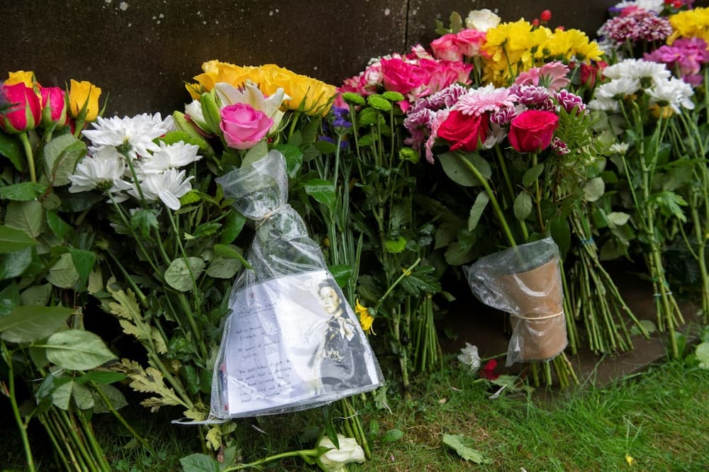 Floral tributes were also left at the queen's Windsor Castle home west of London and outside Holyroodhouse in Edinburgh
