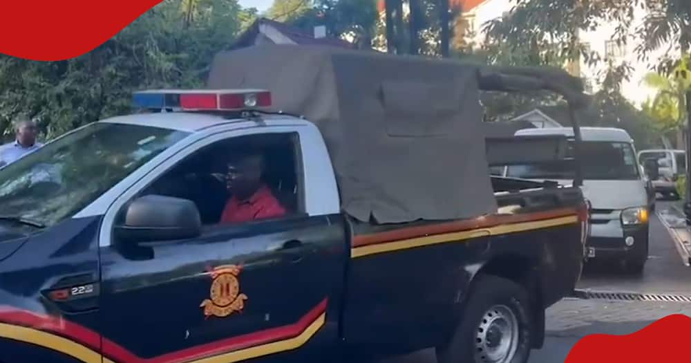 Police vehicle leaving estate where Rita Tinina lived in Kileleswa.