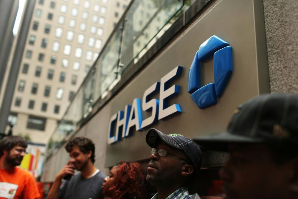 JPMorgan Chase reported a drop in profits after setting aside reserves in case of defaults