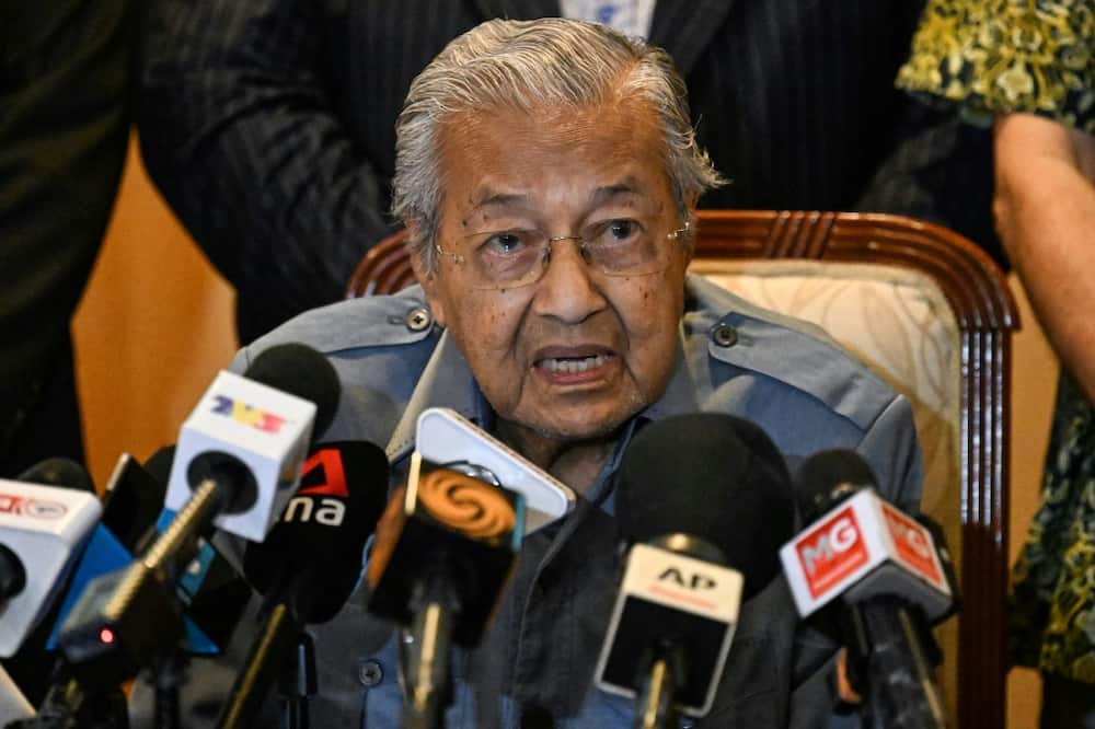 Former prime minister Mahathir Mohamad (pictured), 97, and another ex-leader Muhyiddin Yassin, 75, head two other coalitions contesting the elections