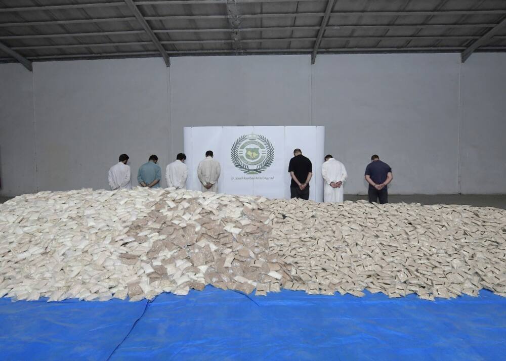 Alleged captagon smugglers who tried to smuggle 47 million pills into Saudi Arabia are paraded before the cameras in Riyadh in August