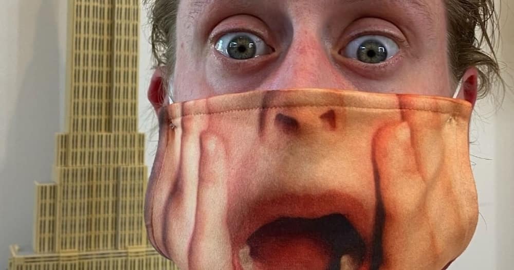 Macaulay Culkin wearing a Home Alone scream mask Photo: culkamania