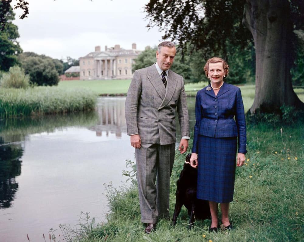 Earl Mountbatten and Lady Edwina Mountbatten walking in the their Hampshire home.