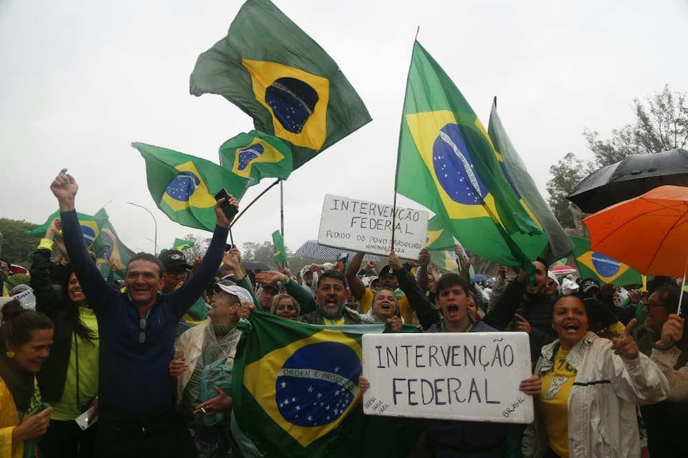 Supporters of President Jair Bolsonaro take part in a protest in the centre of Rio de Janeiro demanding the army helps prevent Luiz Inacio Lula da Silva taking power
