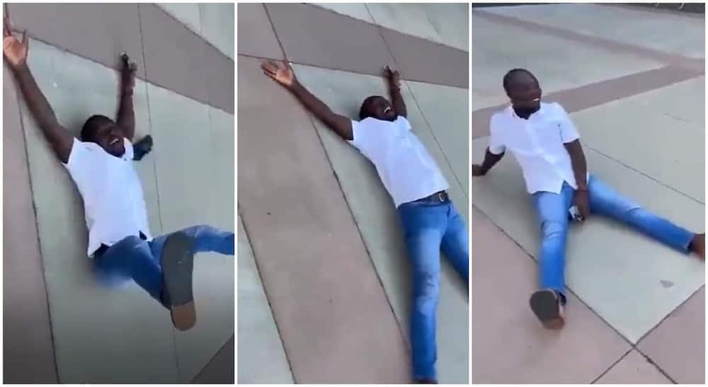 Photos of a Nigerian man lying on the ground to celebrate his arrival in Canada.