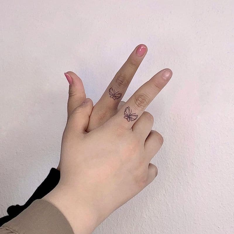 best friend matching tattoos on finger