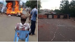 Migori Residents Light Fire to Keep Off Cold Weather During Maandamano