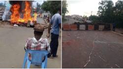 Migori Residents Light Fire to Keep Off Cold Weather During Maandamano