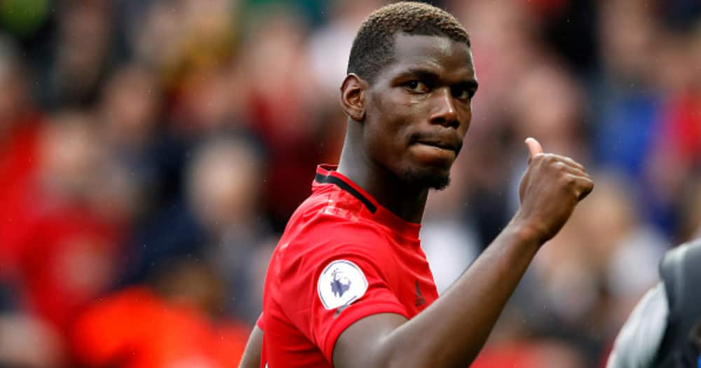 Pogba while in action for Man United. Photo by Martin Rickett.