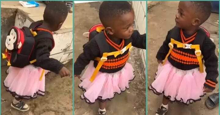 Little boy comes back home from school in a skirt