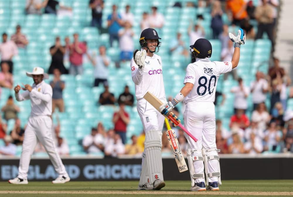 Zak Crawley (left) and Ollie Pope celebrate England's win in the third Test against South Africa