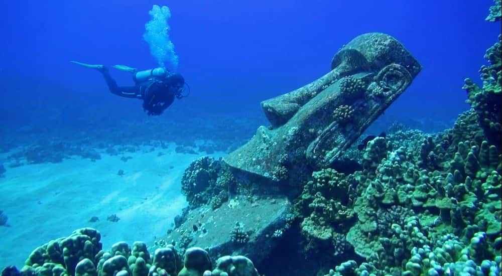 scary underwater statues
