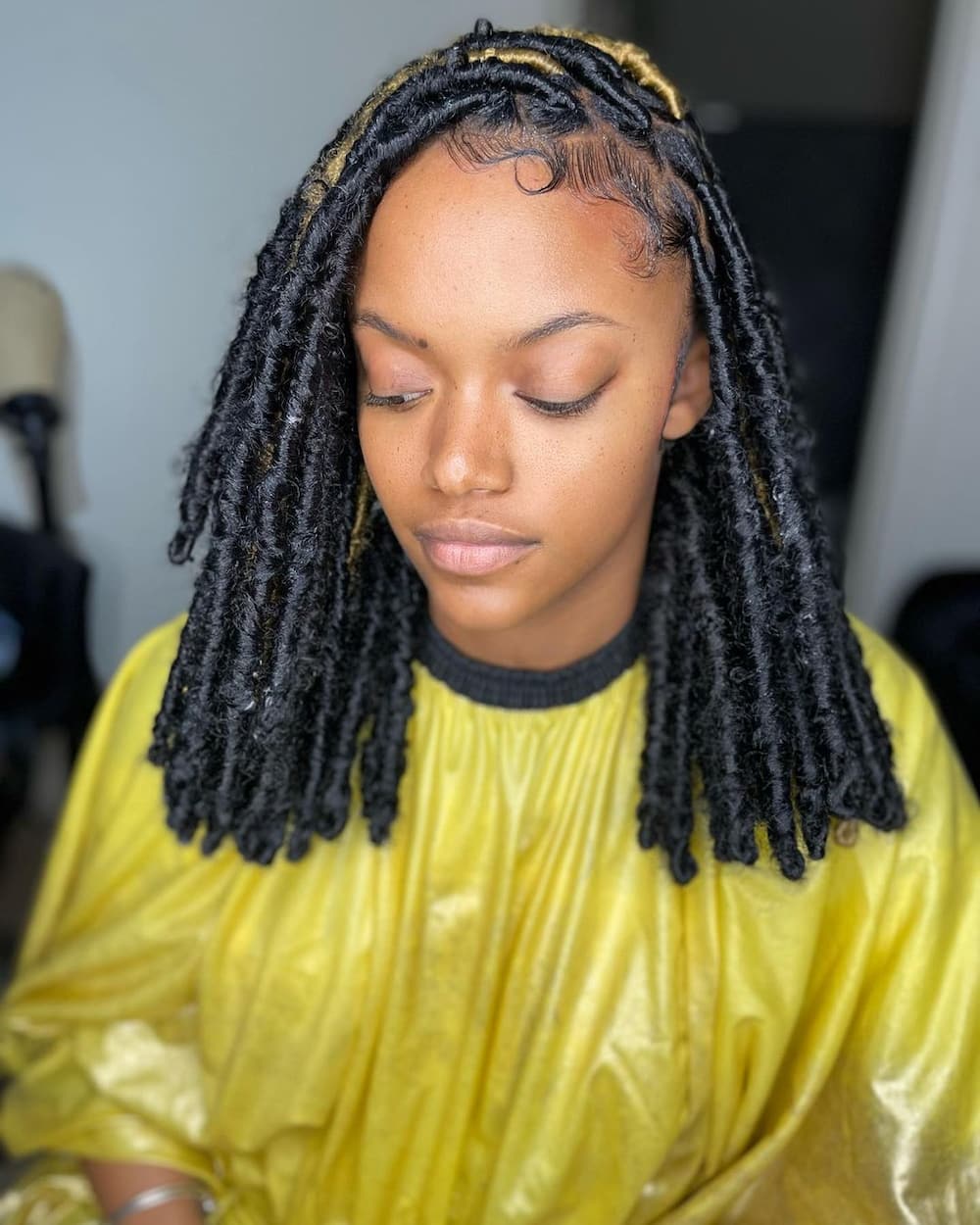 Eya Naturals - Brazilian wool threading with side cornrows