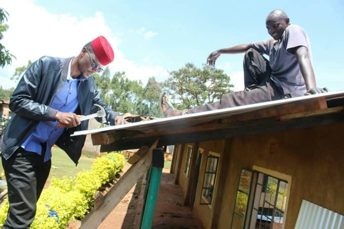 Kimilili MP Didmus Barasa wears patched short, walks bare feet to inspire pupils