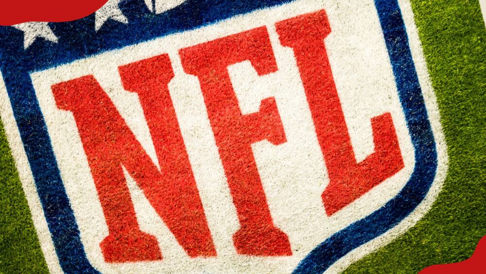An NFL logo is printed on the field