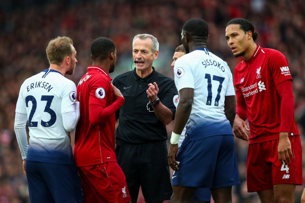 Liverpool vs Tottenham: True identity of 'match official' caught celebrating with Klopp revealed