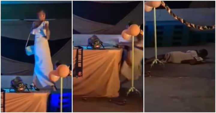 Model falls off stage.