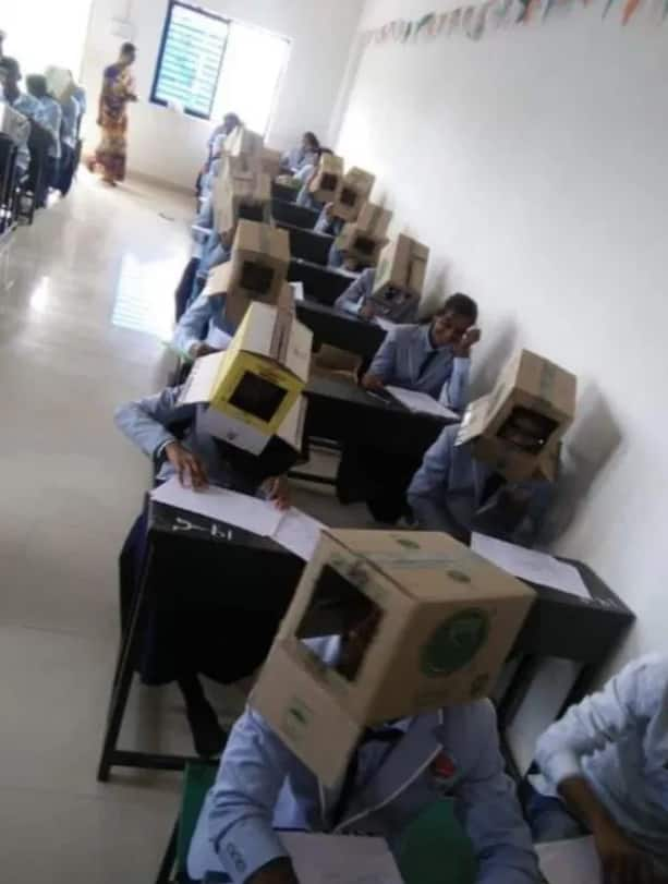 School forces students to wear boxes on their heads in bid to curb cheating during exams