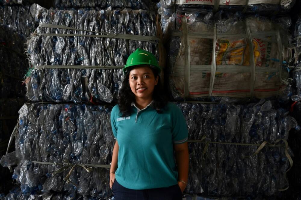 Dian Kurniawati, CEO and founder of Tridi Oasis Group, stands at a plastics recycling factory in Tangerang, Banten province