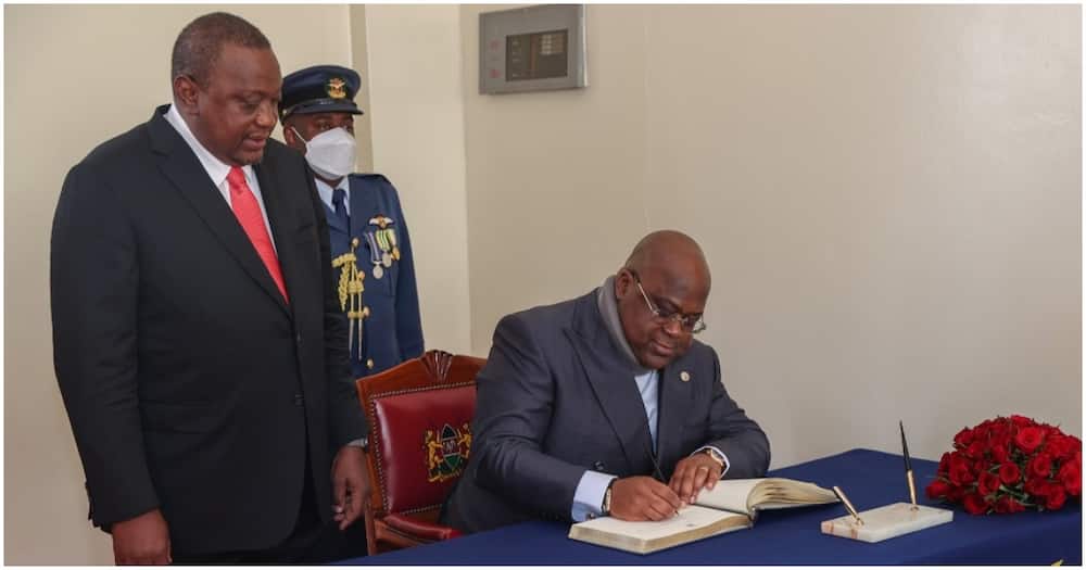 President Uhuru Kenyatta overseeing DRC President Felix Tshisekedi signing the trade treaty.